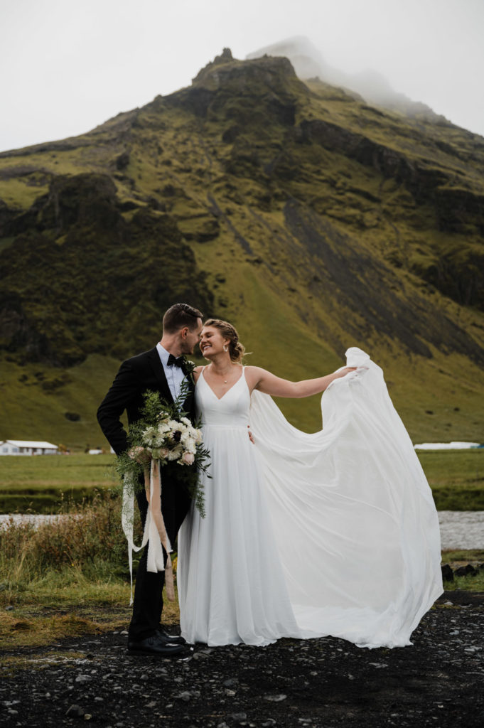 Bride and groom in their wedding attire during their adventure elopement in Iceland