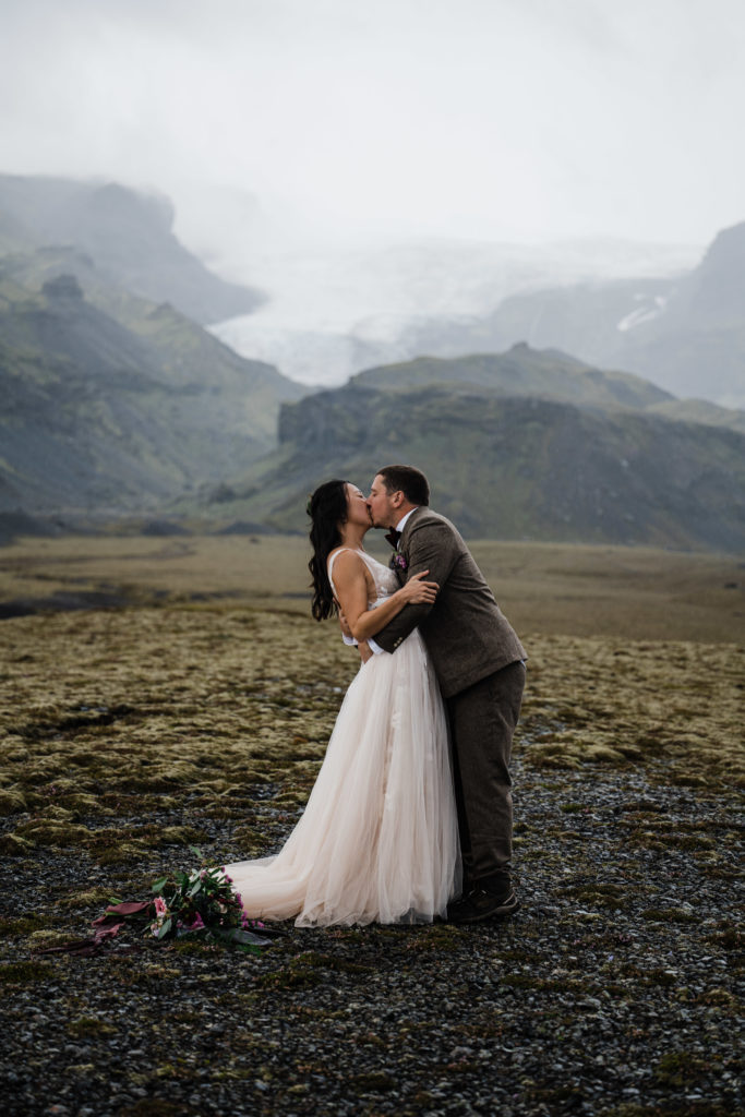 couple getting married in front of a glacier in Iceland