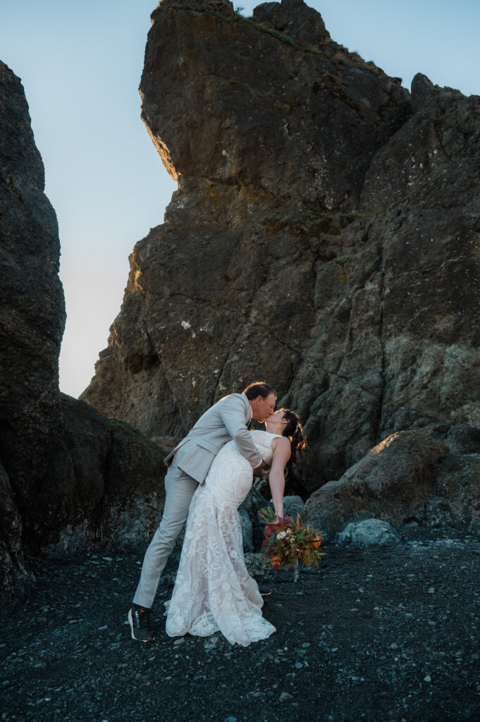 an eloping couple at Ruby Beach
