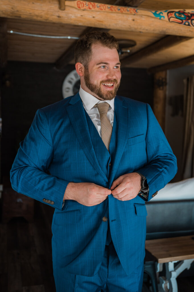 groom getting ready on his elopement day