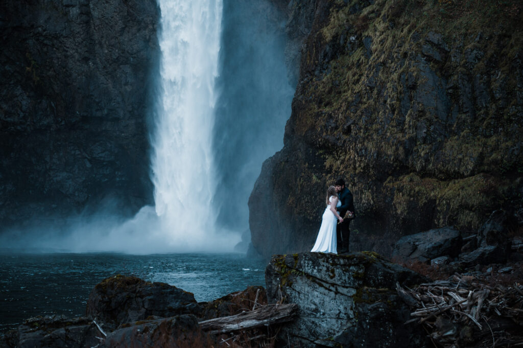 Couple eloping next to Snoqualmie Falls in Washington State