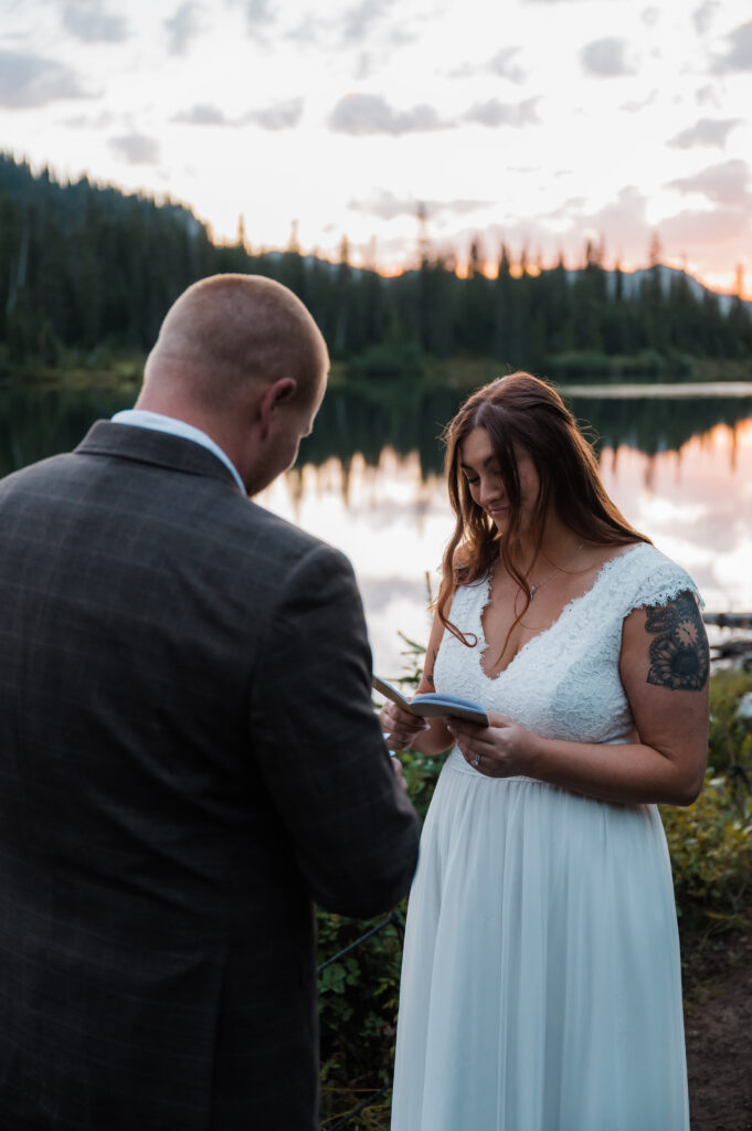 Bride saying her vows while getting married in Mount Rainier National Park 