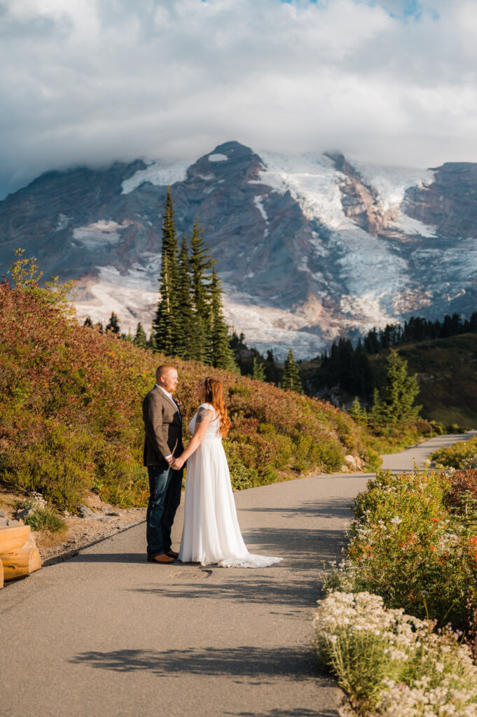 Couple hiking to Myrtle Falls during their elopement day in Mount Rainier National Park