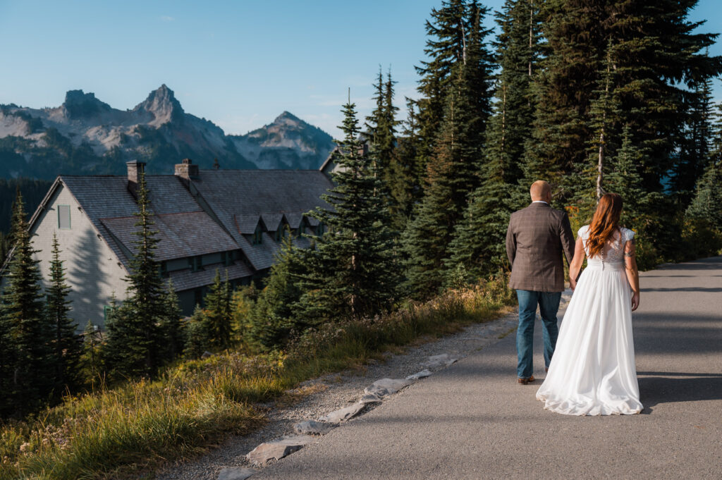 Couple hiking on their elopement day at Paradise in Mount Rainier National Park
