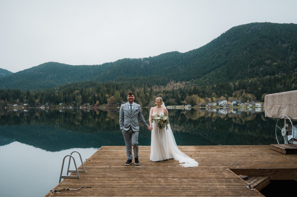 private first look on the dock of their airbnb in Olympic National Park at the start of their elopement day