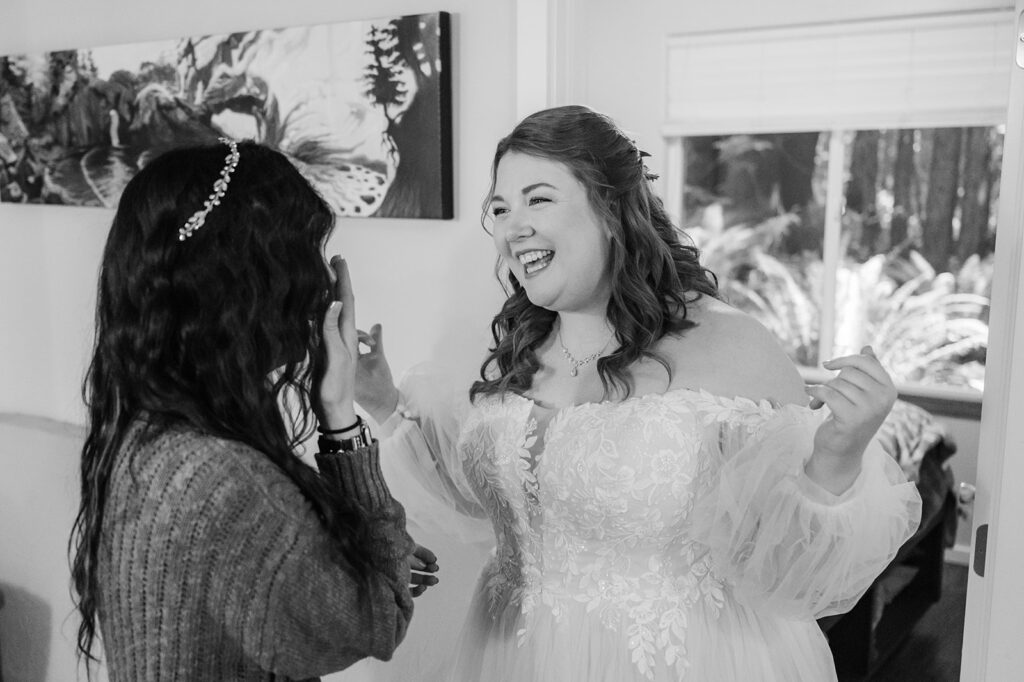 Bride getting ready before a redwood forest elopement