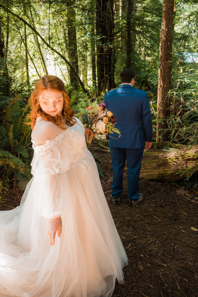 Bride and groom first look in the California redwood forest