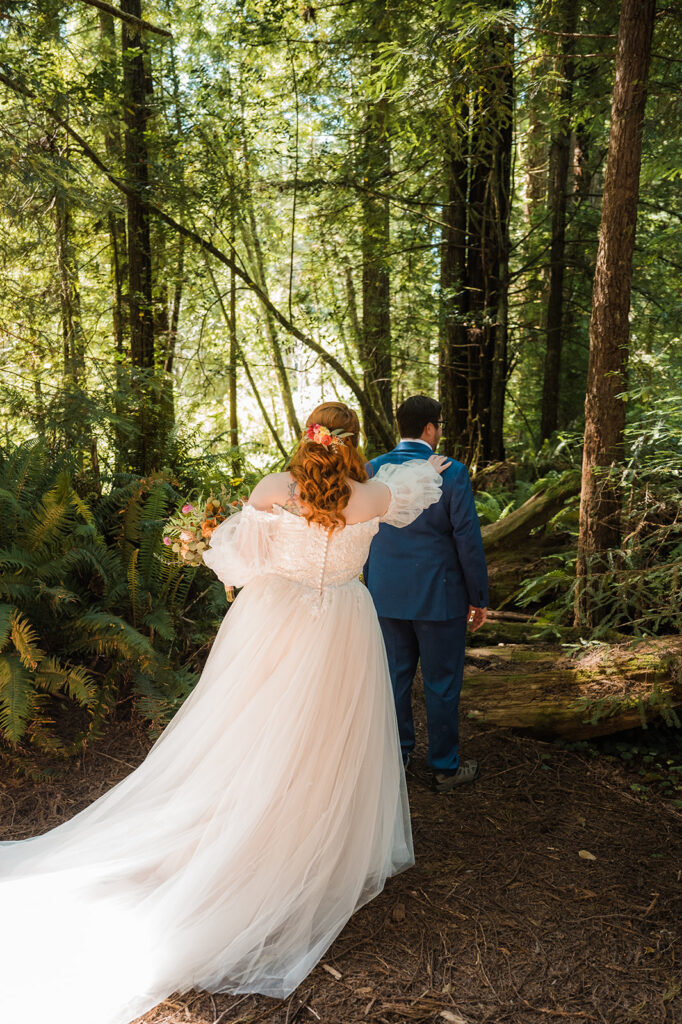 Bride and groom first look in the California redwood forest