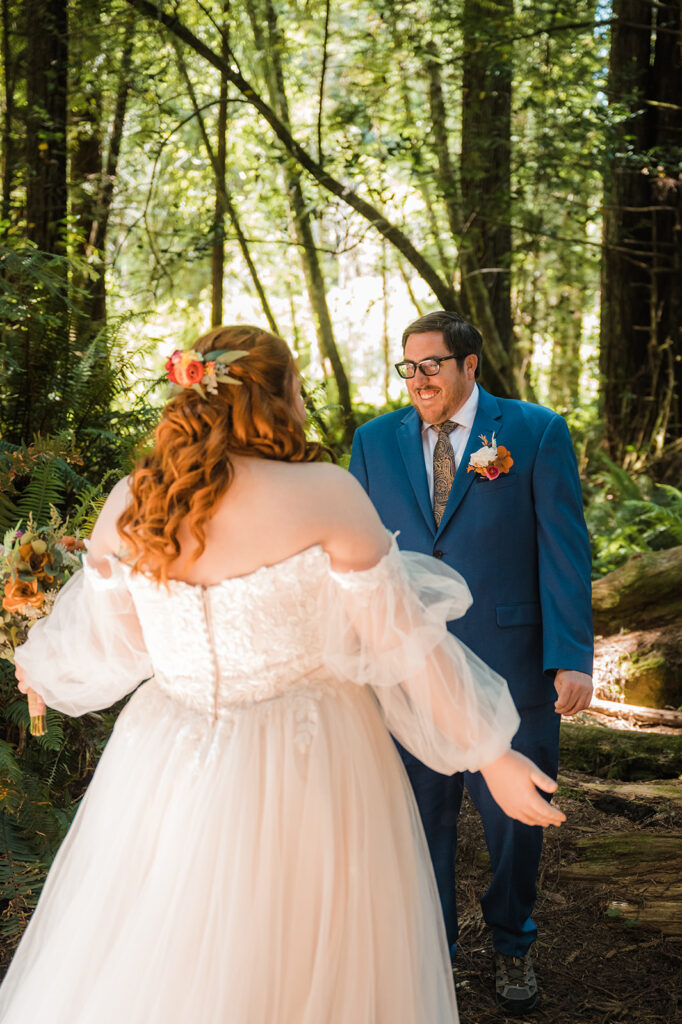 Bride and groom first look in the California redwood forest