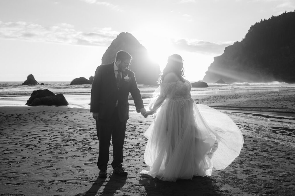 Bride and groom dancing on Whaleshead Beach