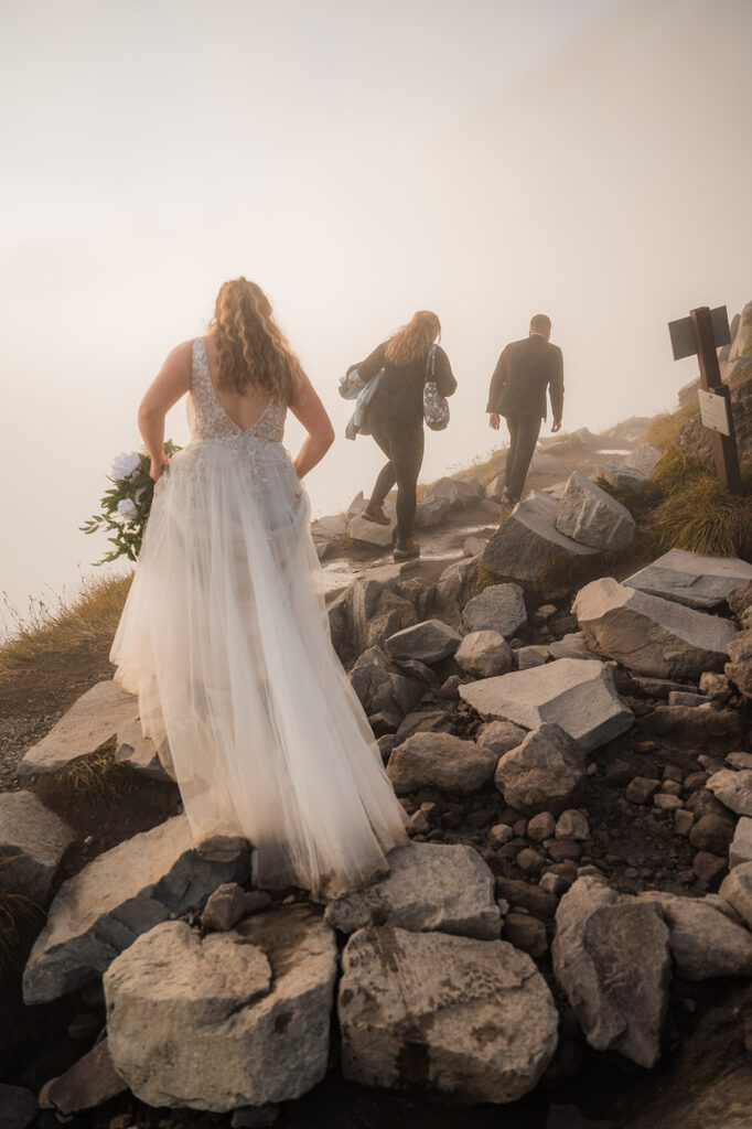 Bride and groom hike Skyline Trail with two of their friends