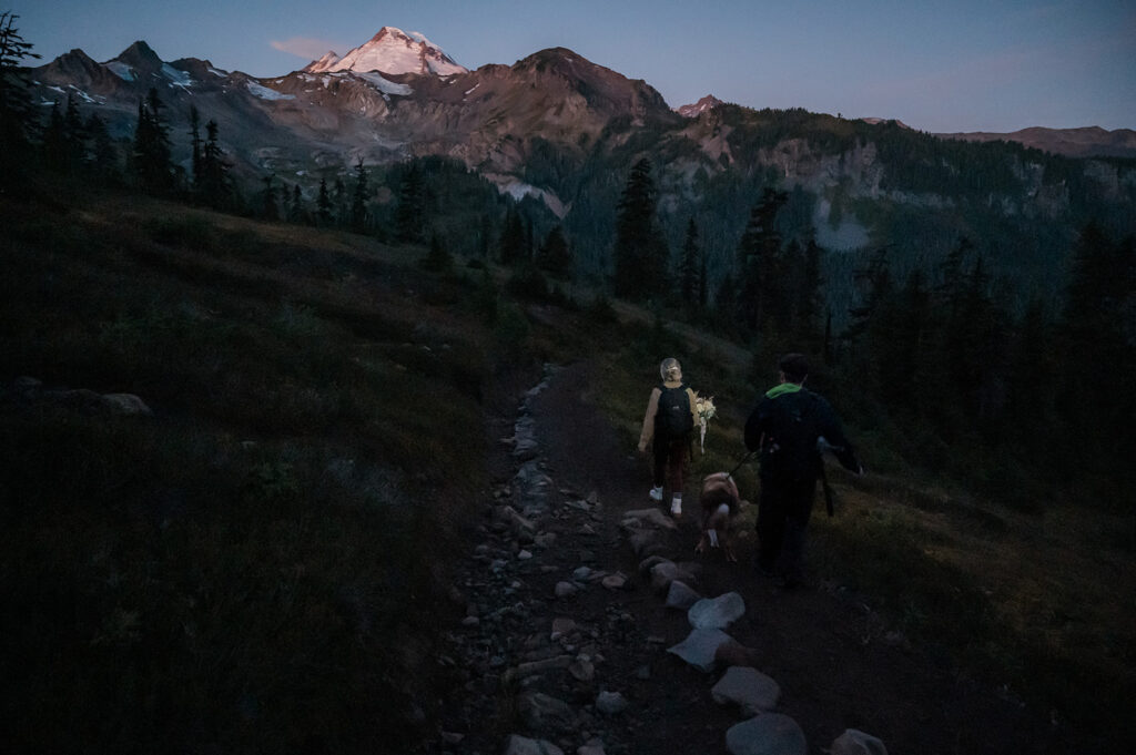 Bride and groom embark on an early hike to Iceberg Lake