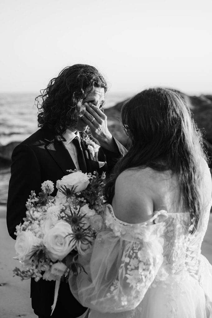 Bride and groom have an emotional elopement ceremony on Rialto Beach