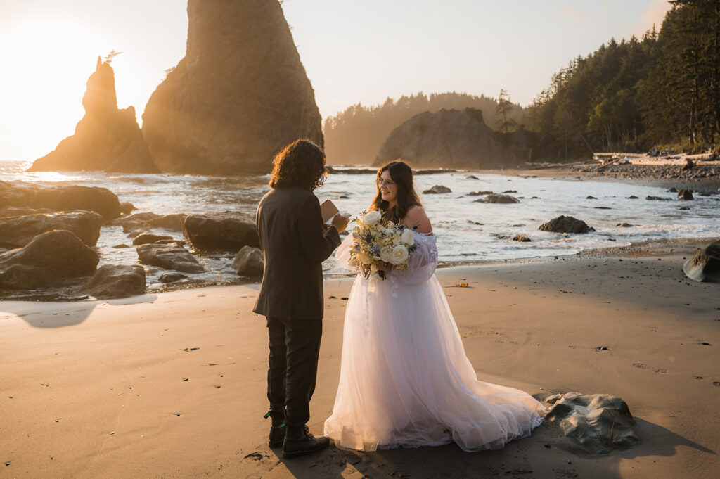 Bride and groom have an emotional elopement ceremony on Rialto Beach