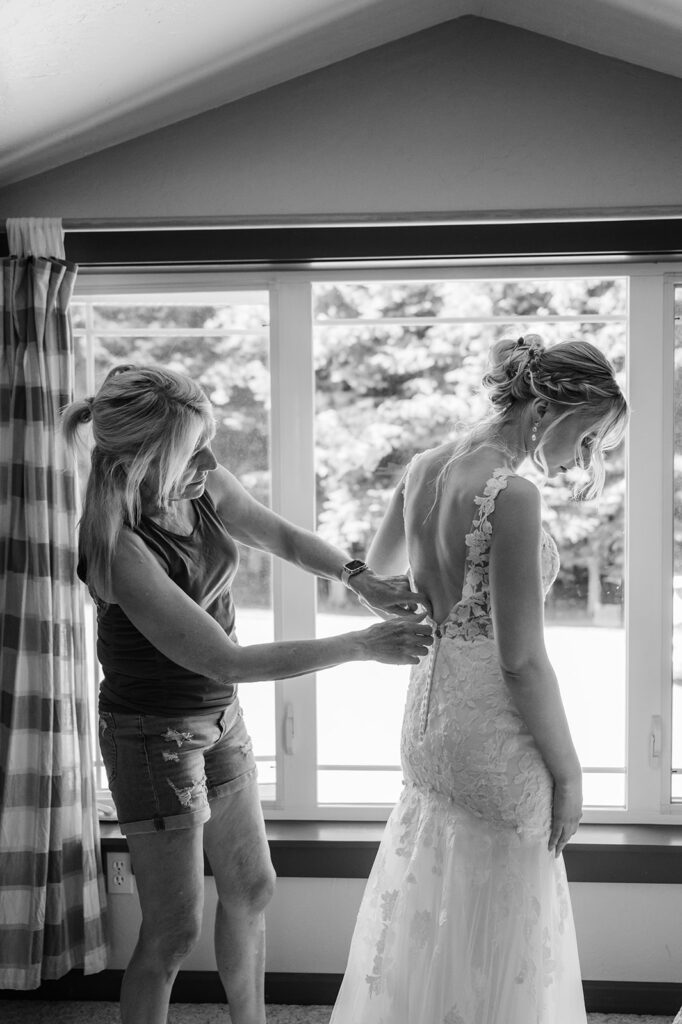 Bride gets ready for an Olympic National Park wedding ceremony