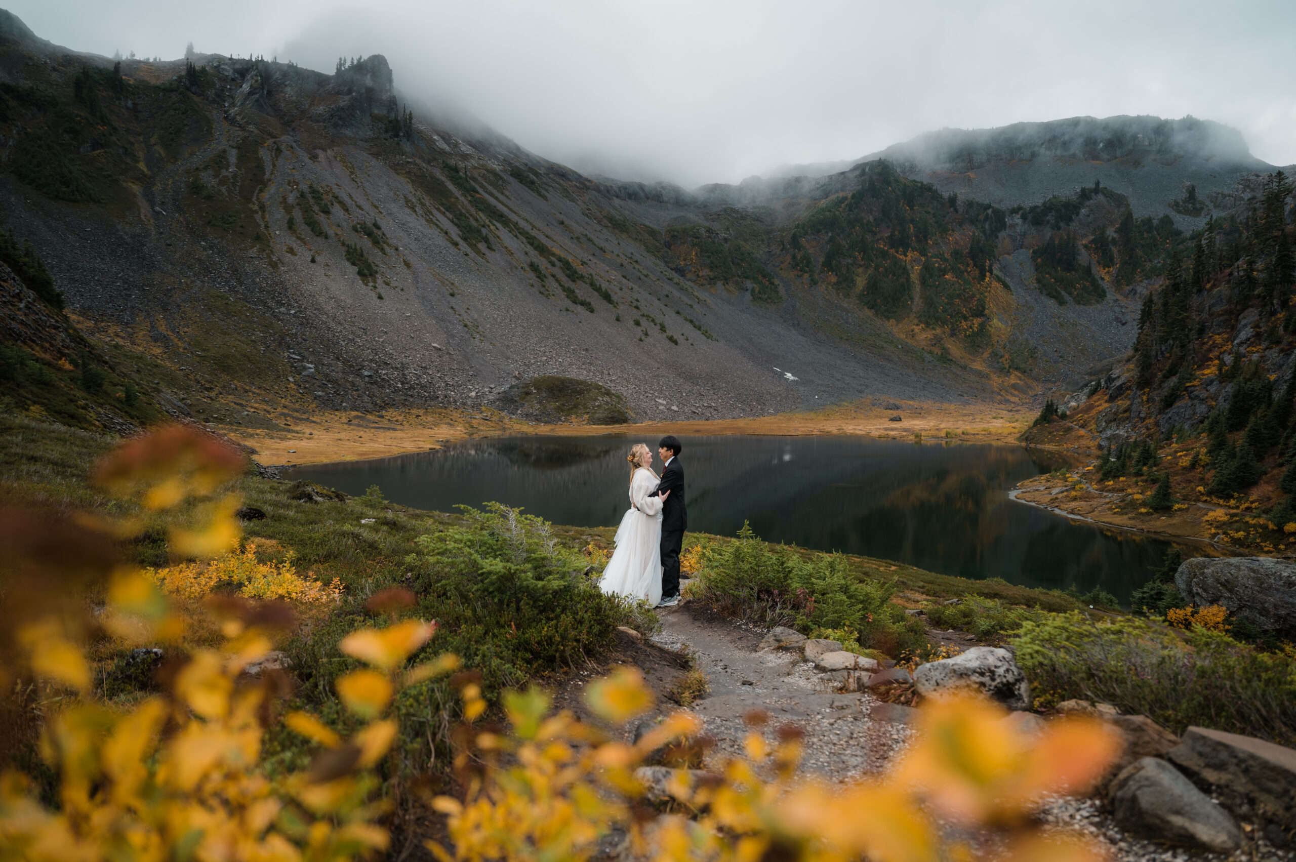 fall colors at bagley lakes on a couples moody elopement day in the north cascades