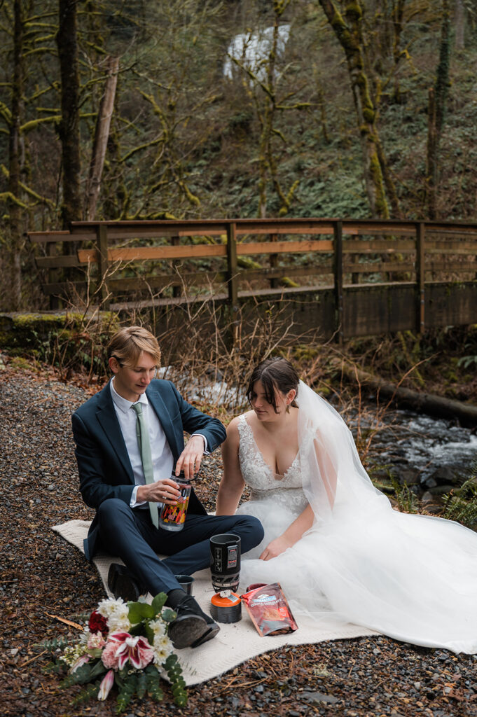 Bride and groom have a picnic and make hot cocoa after their elopement ceremony