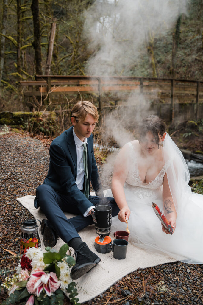 Bride and groom have a picnic and make hot cocoa after their elopement ceremony