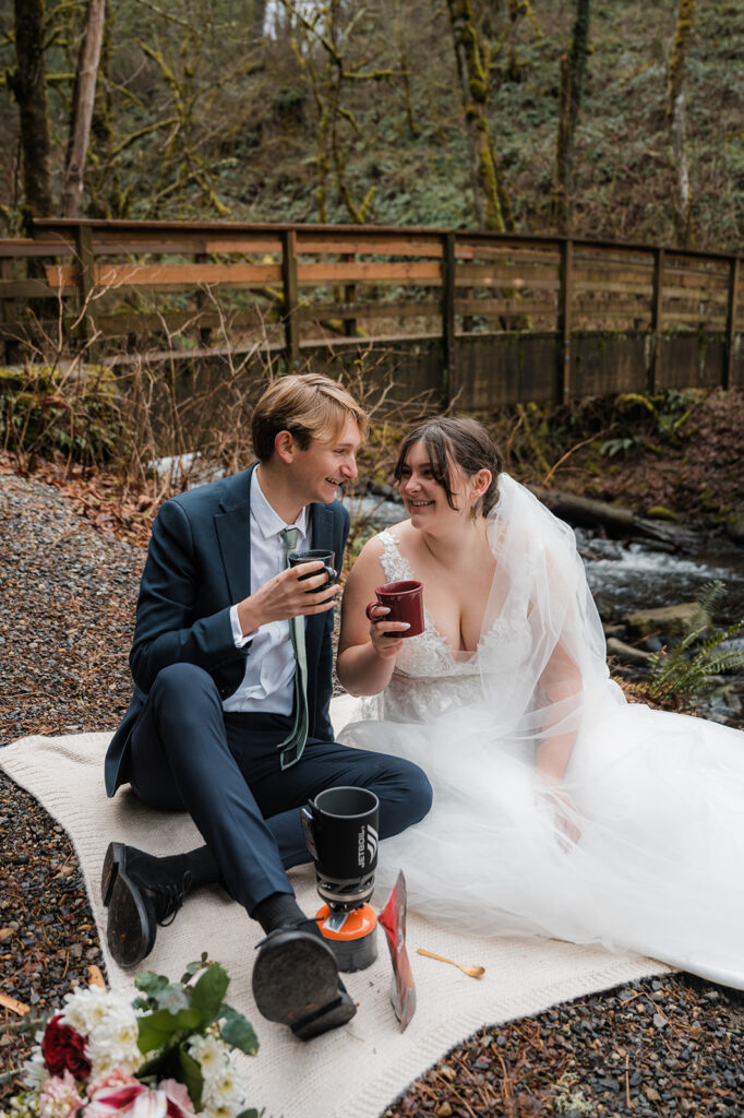 Bride and groom have a picnic and make hot cocoa after their elopement ceremony
