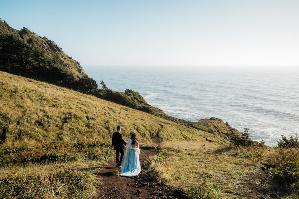 couple hiking down to elk flats on their elopement day