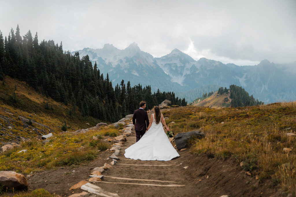 Adventurous elopement couple hiking in October at Mt. Rainier