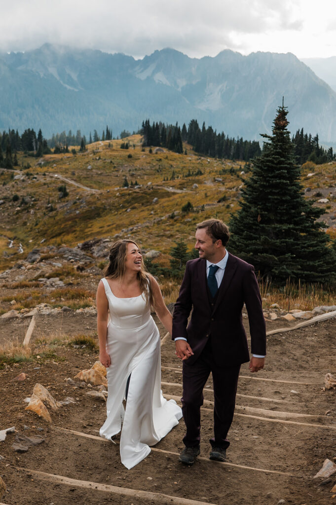 Adventure elopement at Mt. Rainier with couple exploring Skyline Trail