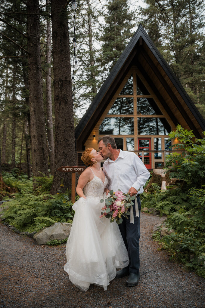 Cozy cabin exterior at Salted Roots Cabins surrounded by trees